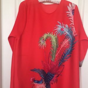 Red pleated dress with Phoenix design